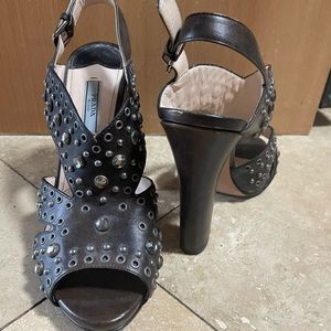 Prada heels with gemstone and metal detail